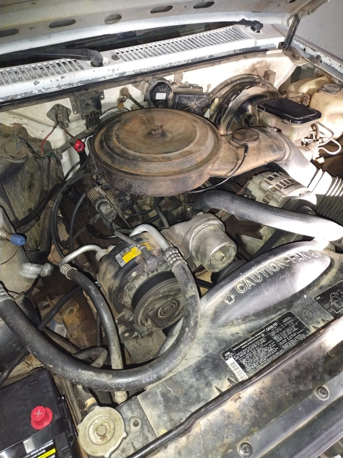 Mobile mechanic testing a car battery and starting system in Dallas